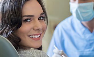 Smiling woman in dental chair