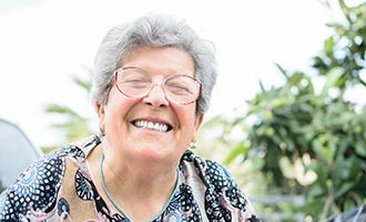 Woman smiling outside