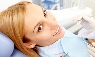 Smiling woman in dental chair