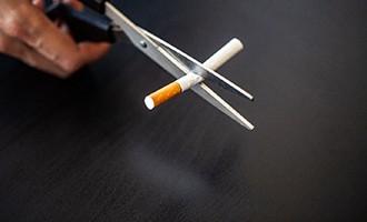 Scissors cutting a cigarette in Massapequa Park