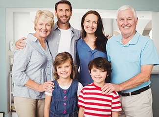 Three generations of family smiling together