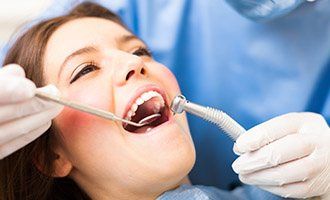 woman receiving dental work