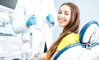 Woman smiling in dental chair