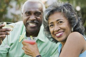 A senior couple enjoying drinks. 