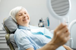 Woman checking teeth