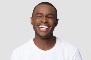 man smiling getting answers to Invisalign questions