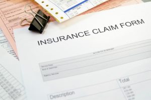 Insurance claim form on desk
